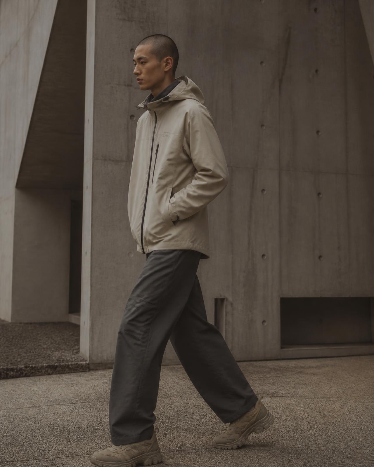 Technical outerwear worn on a city street
